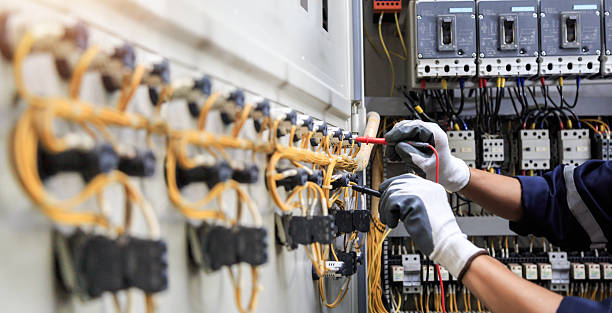 Professional Electrician technician working in Wells Branch, TX